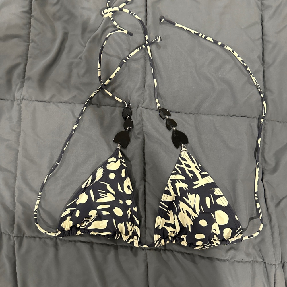 Black and beige pattern triangle bikini top with detail plastic shape straps
